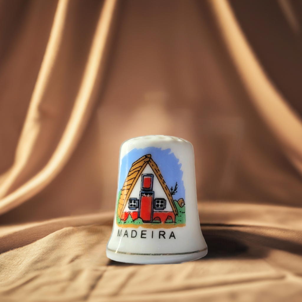 Dedal com imagens da madeira